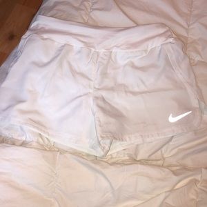 white nike shorts